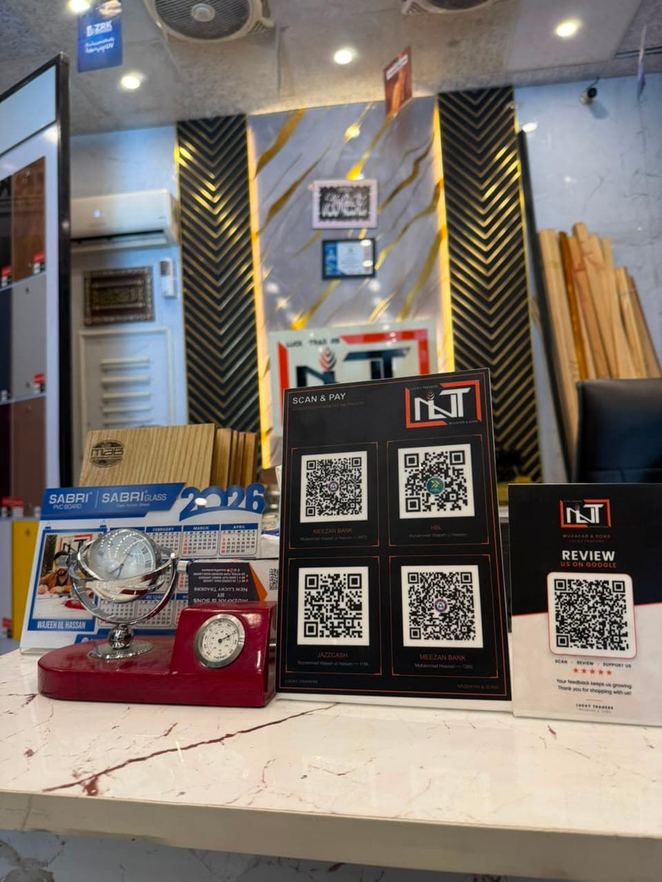 TapCard review and payment cards on a client counter in Lahore